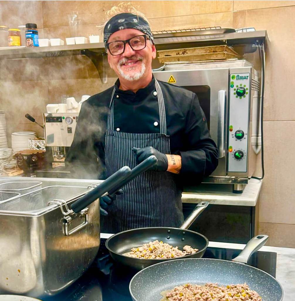 Chef Jimmy cooking a hot dish in the Villa Gioiella kitchen