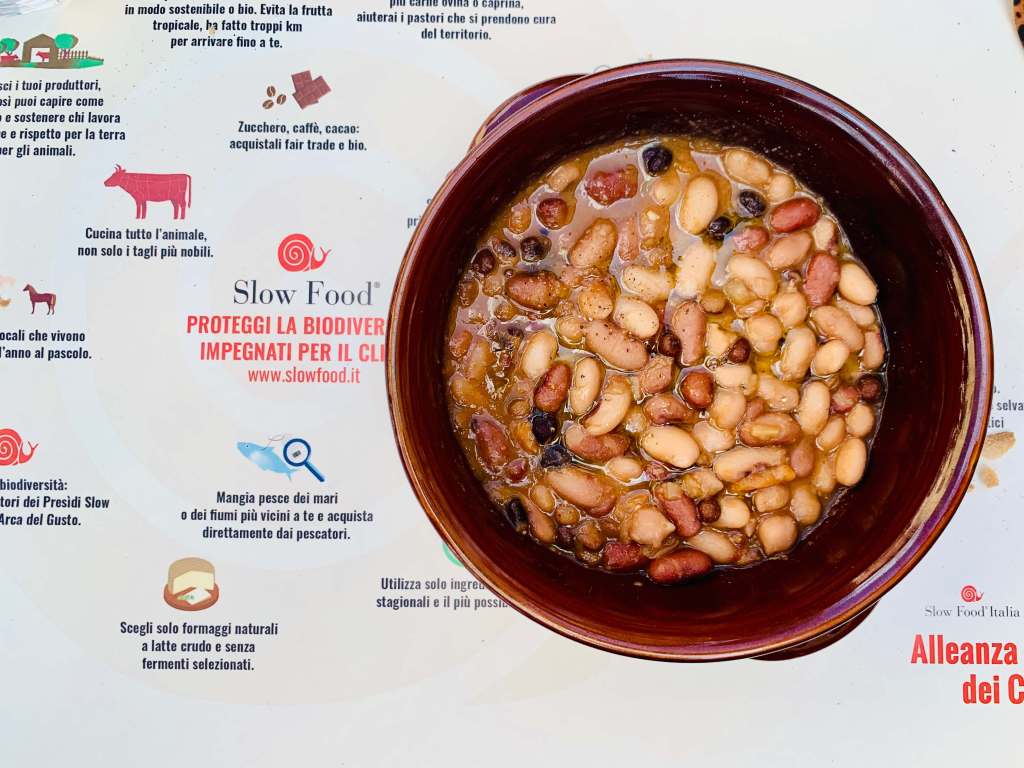 Slow food dining in Chiusi Tuscany with seasonal Tuscan dishes served in a rustic restaurant setting